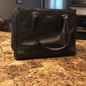 Medium to large size coach bag! Practically brand